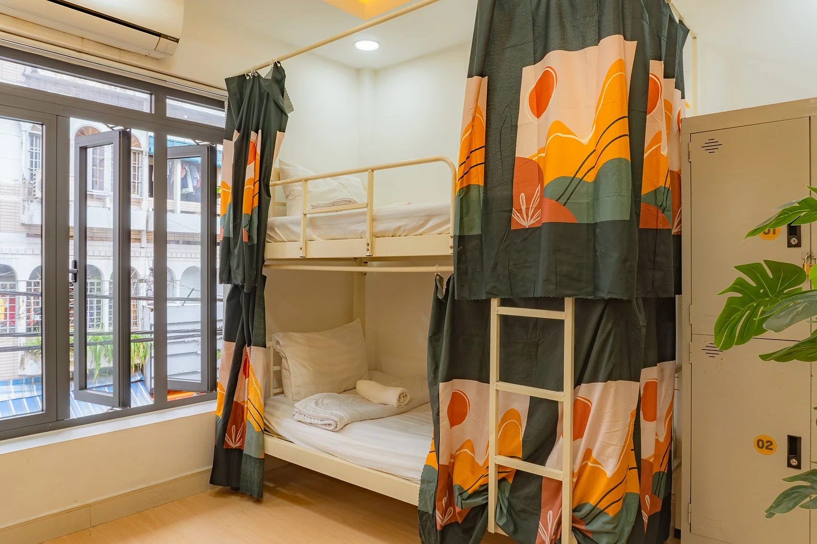 Dorm bed beside window